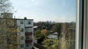 a view of a city from a window of a building at 3 bedroom cosy apartment 20 mins to Centre in Moffat