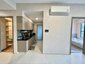 Η κουζίνα ή μικρή κουζίνα στο West Gate Bình Chánh