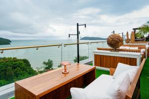 a view of the ocean from the balcony of a house at The RIYAZ Lavanya Langkawi in Pantai Cenang +54 photos