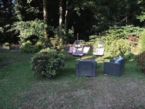 Un jardín fuera de Gîte de l'Ancienne Scierie