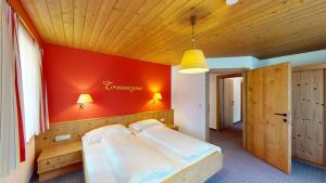 Postel nebo postele na pokoji v ubytování Hotel - Restaurant - Sonnblick