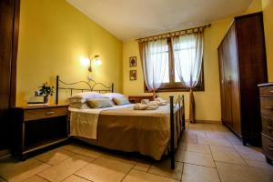 Postel nebo postele na pokoji v ubytování Villa Ellea