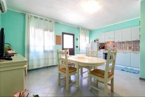 Η κουζίνα ή μικρή κουζίνα στο La Casa Di Rosa