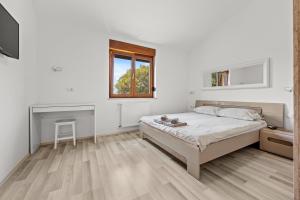 Postel nebo postele na pokoji v ubytování Villa Markulin, Šišan + 37 fotografií
