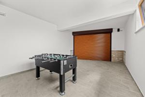 Herní místnost v ubytování Villa Markulin, Šišan