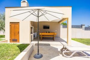 Patio nebo venkovní prostory v ubytování Villa Markulin, Šišan