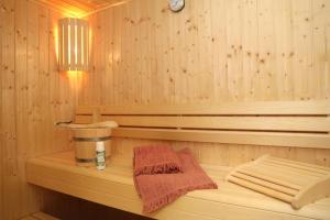 a sauna with a sink and a towel on a counter at diemelblick acht - in Heringhausen