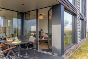 Αίθριο ή υπαίθριος χώρος στο Exklusive Ferienwohnung BeltStrand mit 2 Schlafzimmern und Garten