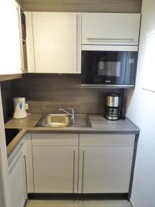 Kuchyň nebo kuchyňský kout v ubytování Ferienwohnung & App. Rosemarie
