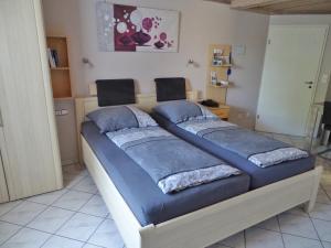 Postel nebo postele na pokoji v ubytování Ferienwohnung & App. Rosemarie