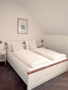 Voodi või voodid majutusasutuse Penzion Apartmány Libošovice toas