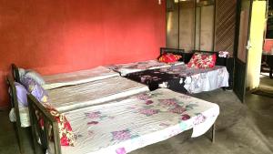 Postel nebo postele na pokoji v ubytování Coca Cola Hostel Malabe
