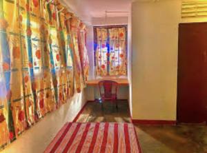 Postel nebo postele na pokoji v ubytování Coca Cola Hostel Malabe