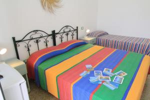 Postel nebo postele na pokoji v ubytování B&B Monterossi