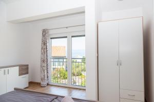 En eller flere senge i et værelse på Katarina + 20 billeder