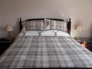 Postel nebo postele na pokoji v ubytování Arisaig Guest House