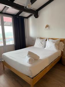 Postel nebo postele na pokoji v ubytování Hotel San Nikolas Sea Views