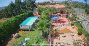 Zahrada ubytování Bungalow avec piscine