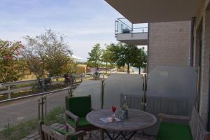 Balkón nebo terasa v ubytování Inselblume 48 - Kuschlige Ferienwohnung in der Strandburg