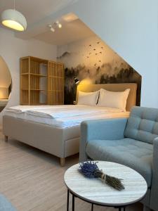 En eller flere senge i et værelse på Vila Salt & Soul + 80 billeder