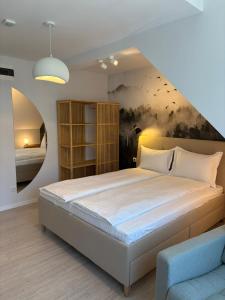 a bedroom with a large bed in a room at Vila Salt & Soul in Sovata