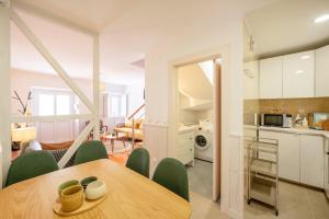 Η κουζίνα ή μικρή κουζίνα στο GuestReady - Lovely place in Seixal +26 φωτογραφίες