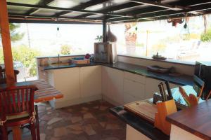 Kuchyň nebo kuchyňský kout v ubytování Little Bali Javea
