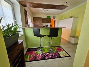 Kuchyň nebo kuchyňský kout v ubytování Gemütliche Wohnung in der Nähe von Gmunden