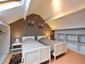 Voodi või voodid majutusasutuse Magnificent Holiday Home in Libin with Barbecue toas