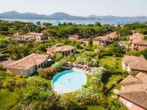 an aerial view of a resort with a swimming pool at Domaine de l'Astragale in Saint-Tropez