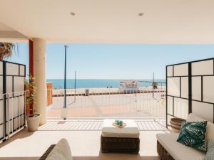 a living room with a view of the beach at Marsalada 2 - Apartment with sea view in Playa de Mar