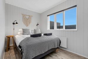 Voodi või voodid majutusasutuse Ocean Break Cabins toas