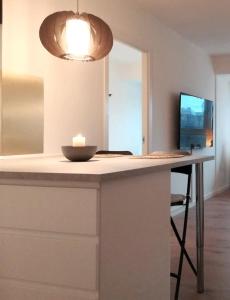 Kuhinja oz. manjša kuhinja v nastanitvi Nordic style apartment in central Aalborg