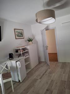 Kuchyň nebo kuchyňský kout v ubytování Guest House Tena