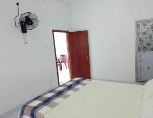 Postel nebo postele na pokoji v ubytování Tropical Suites - Airport Transit Residence