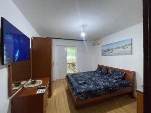 Postel nebo postele na pokoji v ubytování Aparments in the olives + 4 fotografie