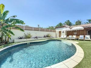 Bazén v ubytování L'Oliveraie d'Eurocentre - Piscine et Spa - Paradis des enfants nebo v jeho okolí