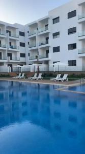 Photo de la galerie de l'établissement Residonce Rmilat Garden U 5-6 vue sur la piscune, à M'diq