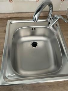 a sink with a faucet in a kitchen at Dai nonni di Preteto in Veccialone +44 photos