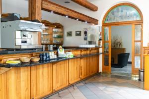 Kuchyň nebo kuchyňský kout v ubytování Hotel Macocha