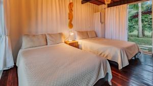 Letto o letti in una camera di Hotel Pietrasanta