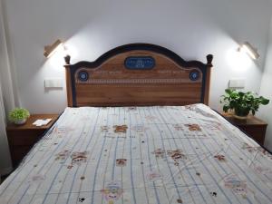 Postel nebo postele na pokoji v ubytování Whale House