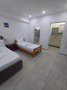Voodi või voodid majutusasutuse VILLA SILVI KSAMiL toas