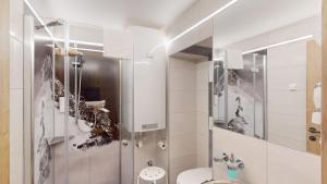 Koupelna v ubytování Hotel - Restaurant - Sonnblick