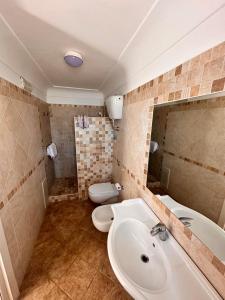 Koupelna v ubytování Hotel 4 Stagioni