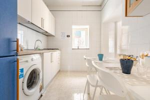 A kitchen or kitchenette at Anema e Core