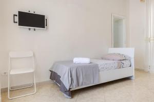 A bed or beds in a room at Anema e Core
