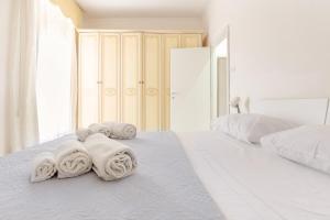 A bed or beds in a room at Anema e Core