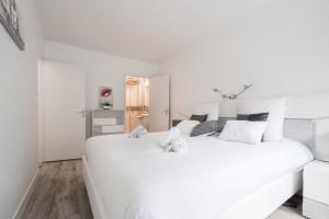 Postel nebo postele na pokoji v ubytování ALI QUIETUDE - Wifi - Parking