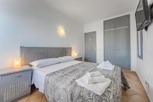 Ένα ή περισσότερα κρεβάτια σε δωμάτιο στο Ocean View - 1 Bedroom Apartment in Los Cristianos